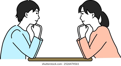 Young man and woman looking at each other with their chins in their hands