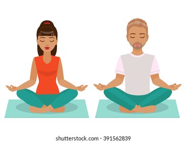 Young man and woman sitting and meditating in the Yoga Lotus position.