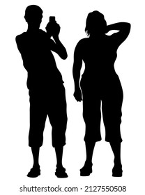 Young man and woman are standing next to each other. Isolated silhouette on a white background