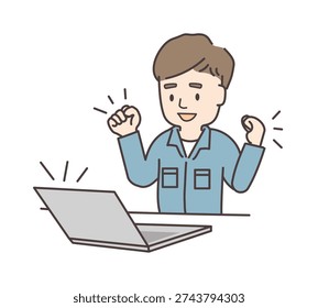 A young man in work clothes making a fist pump in front of a computer.