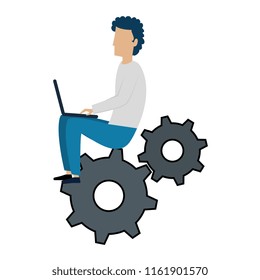 young man working with laptop in gears