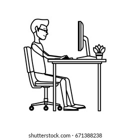 young man working on computer at office desk