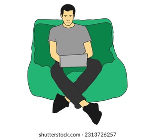 Young man working on the sofa in laptop