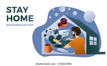A young man works from home at a computer and plays with a funny cat. 
