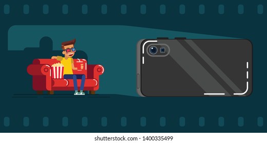 Young men are watching movies online from the smartphone at home.