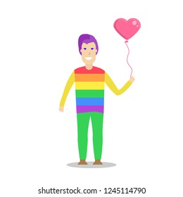 Young men wearing a rainbow t shirt and holding a heart shape balloon. LGBT