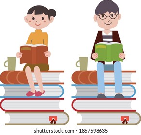 Young men and women sitting on a book and reading