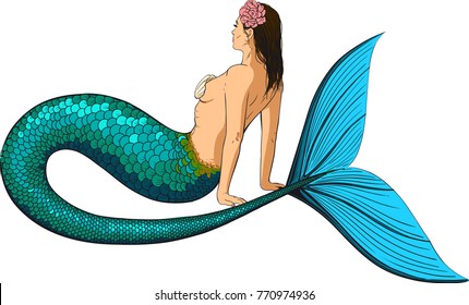 Young mermaid with a large fish tail and a hair woven into the hair sits and looks in the horizon