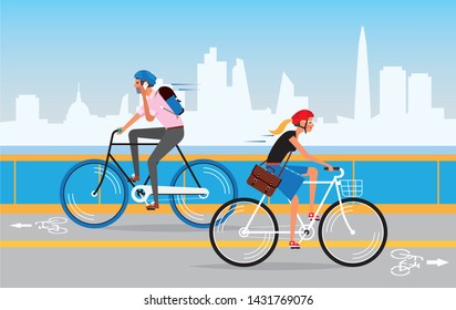 Young modern style Man and woman riding bikes on the bicycle path in different directions in big city. People cycling to work in the morning.