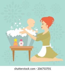 Young mother with baby bathing 