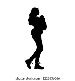 Young mother with baby carrier taking a walk with her baby. Black silhouette isolated on white background. Concept. Vector illustration of woman with child. Stencil. Monochrome minimalism.