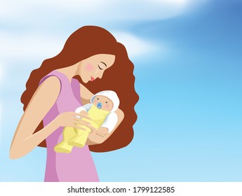 A young mother is holding her newborn baby. Blue sky in the background.

