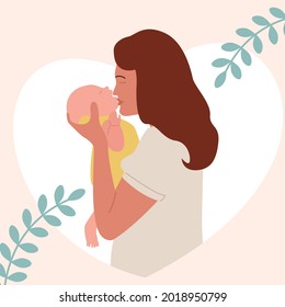 A young mother kisses and hugs her newborn baby. New life and motherhood. Baby card.