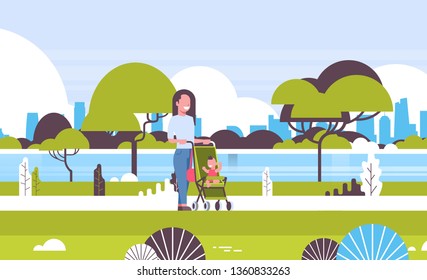 young mother and newborn baby boy in stroller walking urban park woman pushing pram with child happy motherhood concept cityscape background horizontal full length