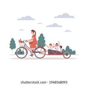 Young mother on a bicycle takes her children for a walk. Children are happy with their mother for a walk. 