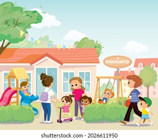 Young Mother Pick Up Her Children Kids From Kindergarten Or Daycare Center Standing In Front Of Playground Of Kindergarten Building. Parents Collect Children After Lessons In Preschool On Summer Day