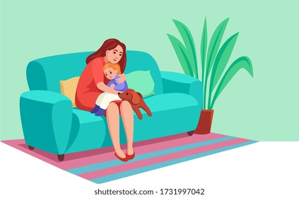 young mother sits at home on couch, hugs her baby, the dog is nearby, they are comfortable.