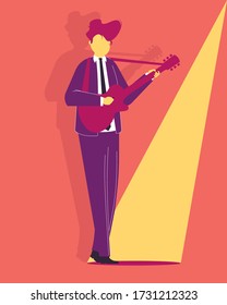 
Young musician plays guitar on stage.