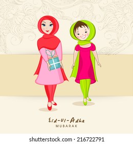 Young Muslim ladies with gift box on floral design decorated beige background for Muslim community festival Eid-Ul-Adha celebrations. 