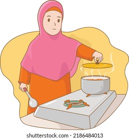young muslimah cooking in the kitchen