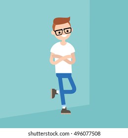 Young nerd guy leaning against the wall / editable flat vector illustration