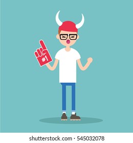 Young nerd wearing horned hat and foam finger / flat editable vector illustration, clip art