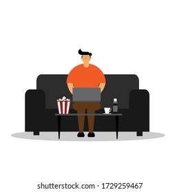 A young office worker using a notebook computer on the sofa at home.