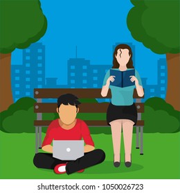 Young people studying on park