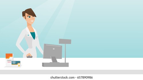 Young pharmacist in a medical gown standing behind the counter in a pharmacy. Pharmacist working in a drugstore. Pharmacist working on a computer. Vector flat design illustration. Horizontal layout.