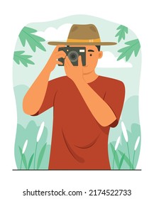 Young Photographer Man Taking Photo of the Nature.