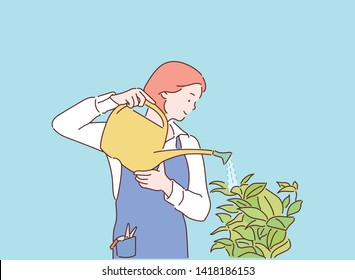 Young plants watering in the garden from a watering can. Hand drawn style vector design illustrations.