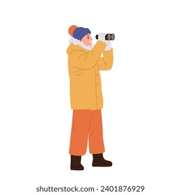 El joven explorador polar que busca a través del binocular haciendo investigación científica, disfrutando de un recorrido ártico