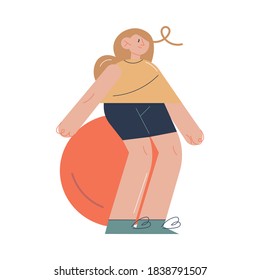 Young positive girl patient exercising on fitness ball during rehabilitation program