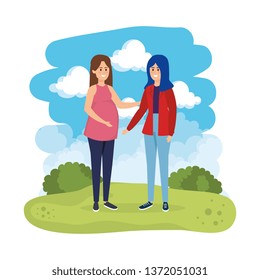 young pregnancy woman and friend in the landscape