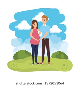 young pregnancy woman and man in the landscape