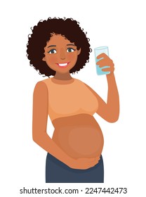 Young pregnant African woman drink a glass of water