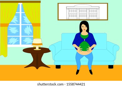 A young pregnant girl sits on a sofa and touches her stomach
