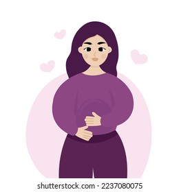 Young pregnant woman holding her belly and smiling. Happy future mother expecting a baby.