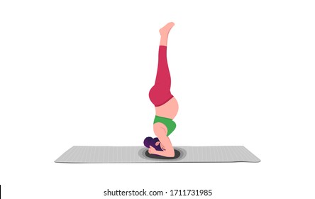 Young pregnant woman practicing yoga