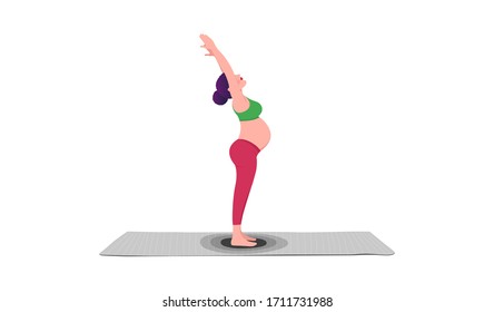 Young pregnant woman practicing yoga