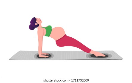 Young pregnant woman practicing yoga