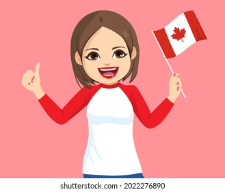 Young Pretty First Nation American Canadian Woman Holding Canada Flag On Pink Background