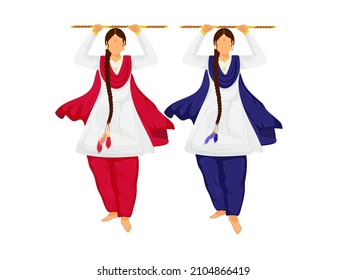 Young Punjabi Ladies Holding Wooden Sticks In Standing Pose.