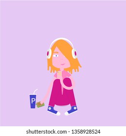 young redhead girl in headphones sitting eating sandwich