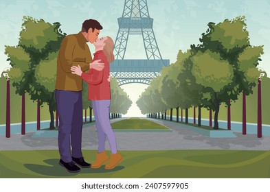 Young romantic couple kissing near the Eiffel Tower in Paris. Loving couple having a date near the Eiffel Tower. Happy couple traveling in Europe.  