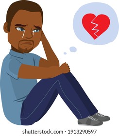 Young sad Black man crying sitting on floor with heartbroken