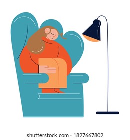 Young sad woman sitting in armchair at home and feeling ill