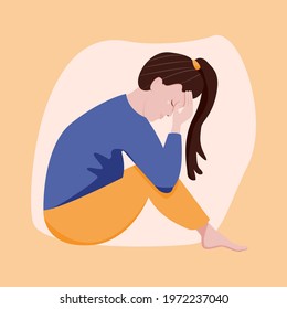 Young sad woman sitting on the floor and crying holding her head. vector flat cartoon illustration