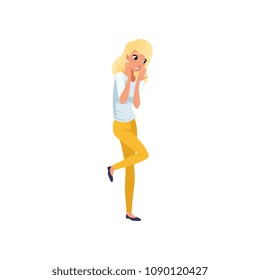 Young scared girl standing and holding her hands near face. Blond woman with terrified face expression. Flat vector design