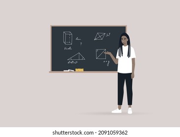 Un joven profesor de escuela explica Geometría señalando en la pizarra con figuras hechas a mano